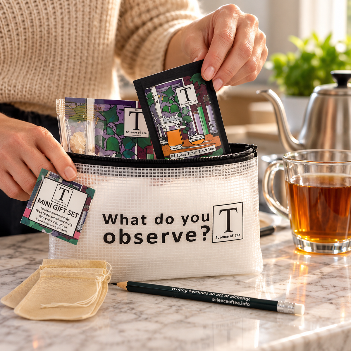 Hand taking a Space-Time Black Tea packet from the Science of Tea Travel Pouch to prepare tea